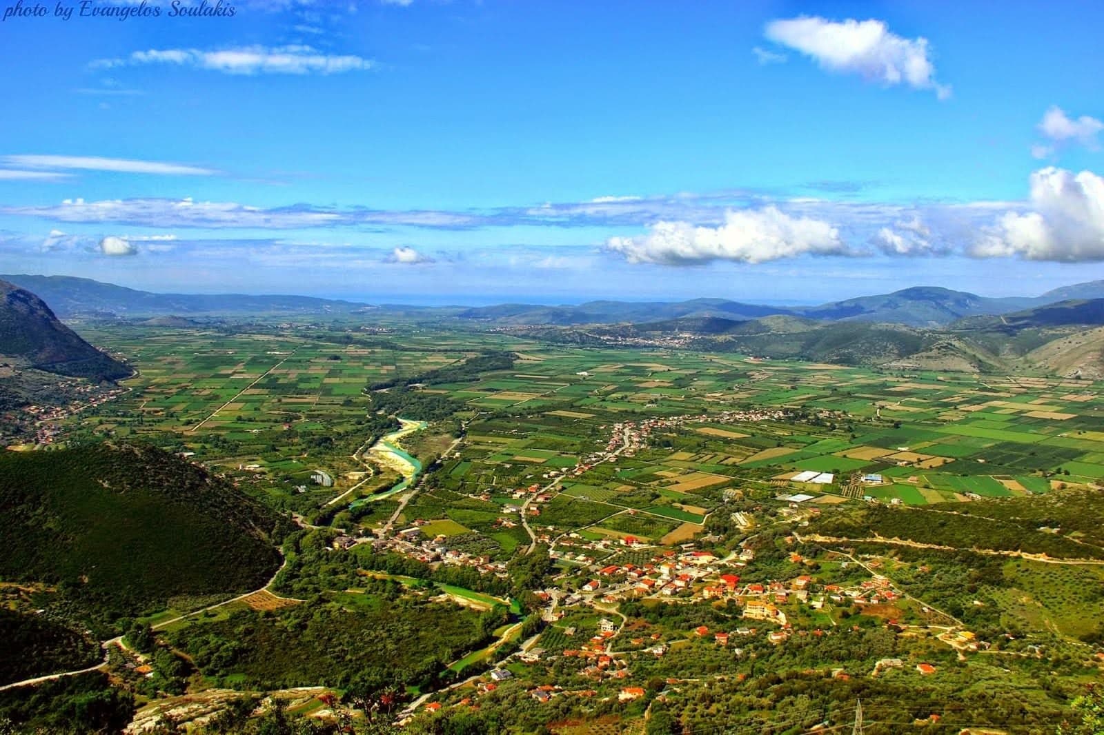 Aerial view of Glyki valley with the Acheron River winding through lush landscapes